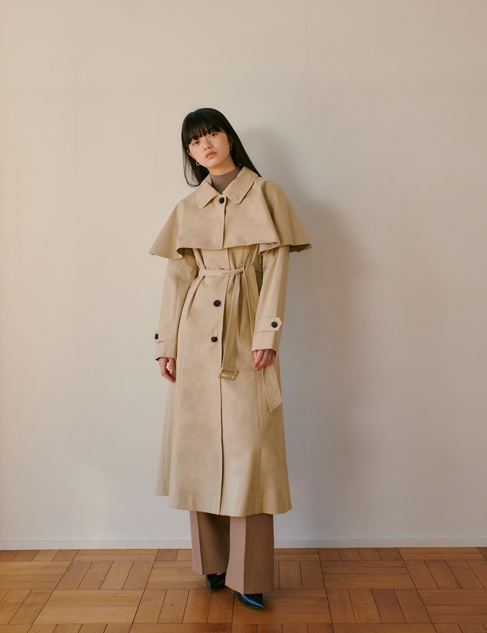 Cape trench coat