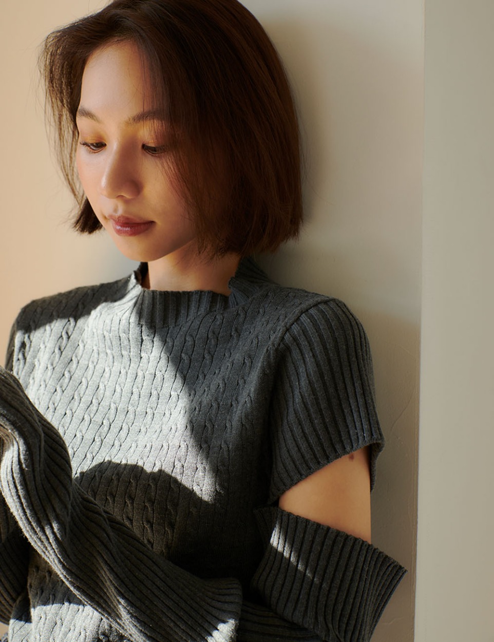 Charm cut cable knit